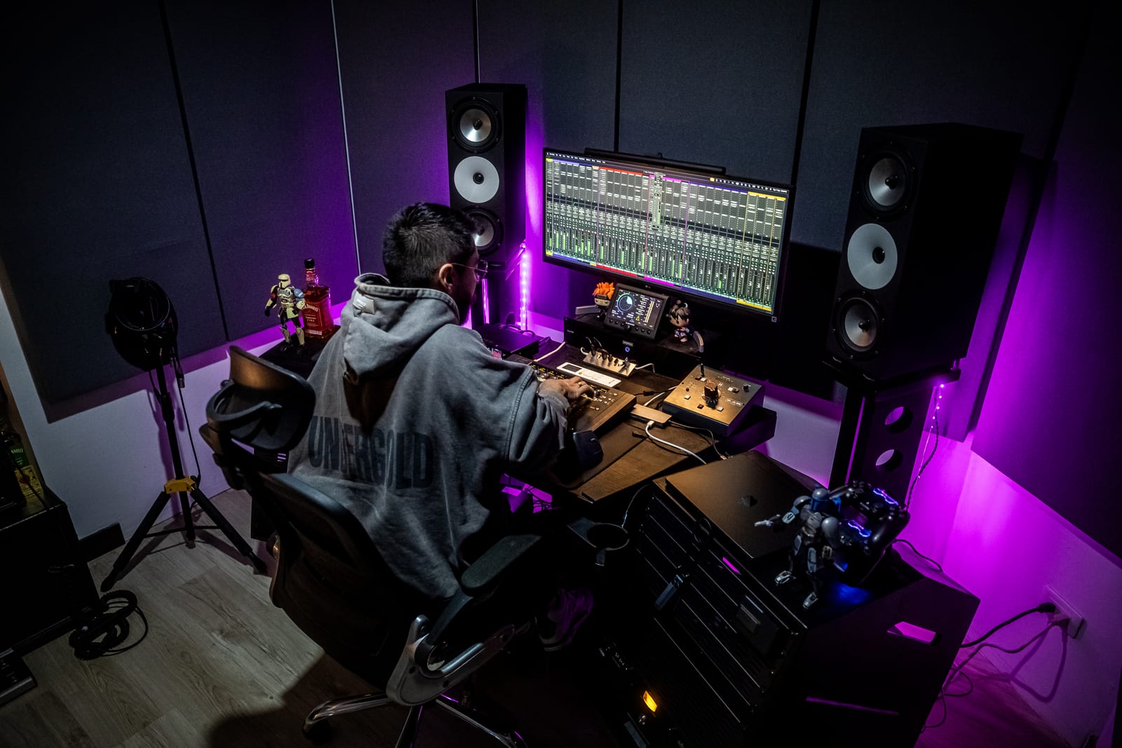 Mogo Music working at the studio desk